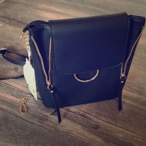 Fashion backpack with interchangeable straps